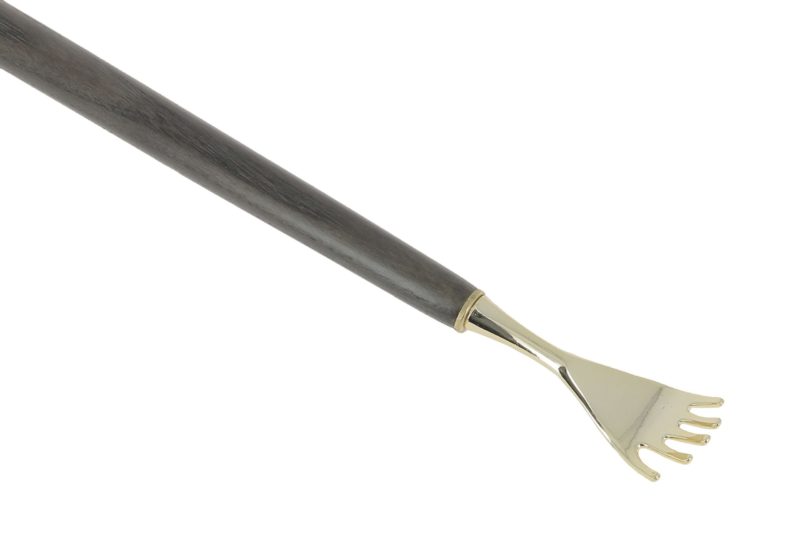 Back-scratcher shoehorns in brass and zinc, and dark ash wood