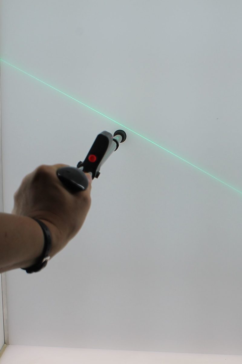Adjustable carbon rod with laser device